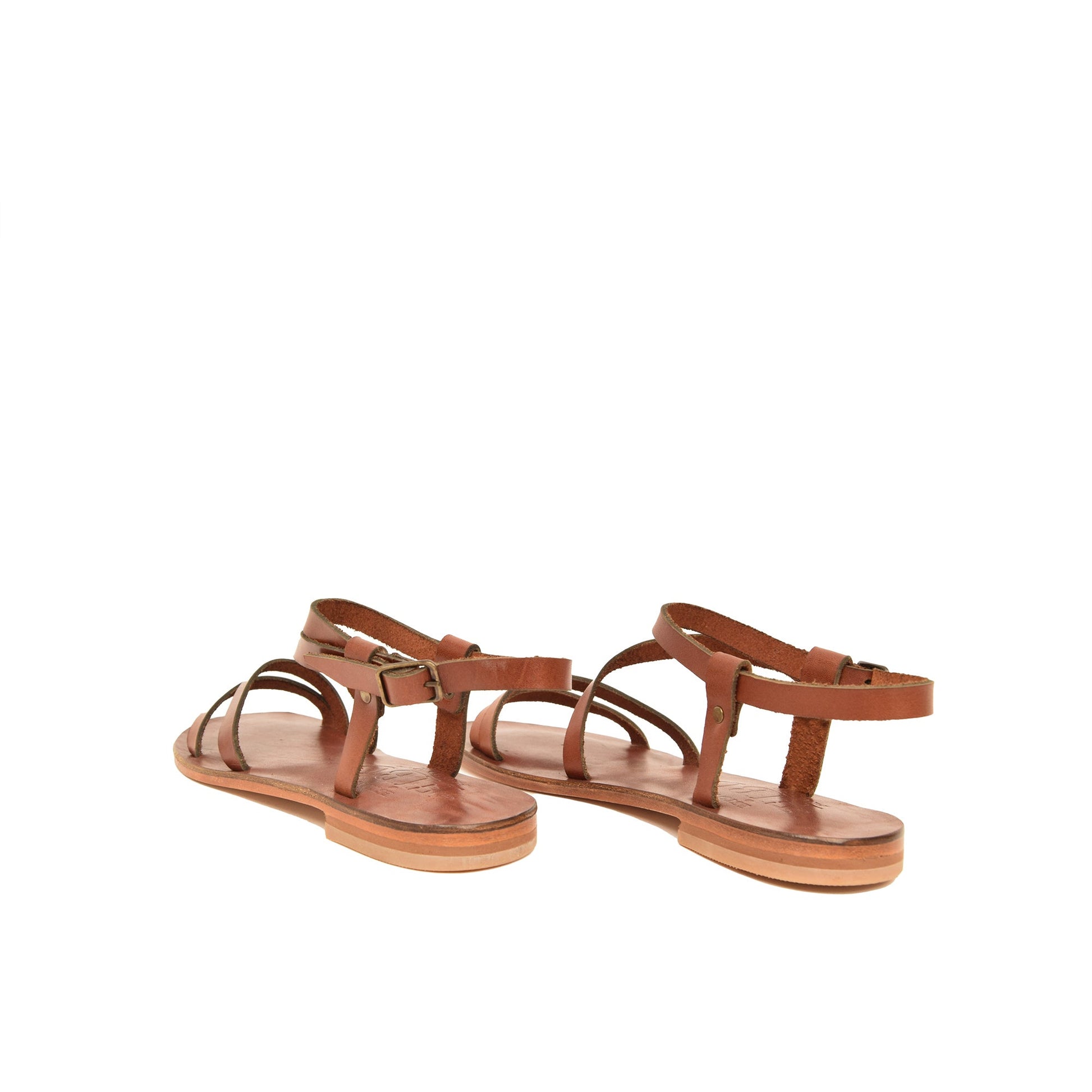 the leather sandals are made from a soft tan leather